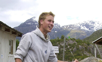 EMBARGOED: NOT FOR USE BEFORE 0001 (LOCAL) MONDAY 11 DECEMBER 2000. Britain's Prince William, seen in this picture released December 10, 2000, uses an axe to chop logs outside the team accommodation in the village of Tortel, Southern Chile during his continuing Raleigh International expedition. William is currently taking a year out before commencing studies at St Andrews University next year. Picture taken between the dates of November 28 - 30, 2000. REUTERS/POOL/Toby Melville